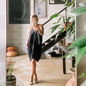 Navy satin dress with layered front and draped open back